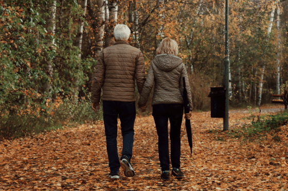 People walking through woods