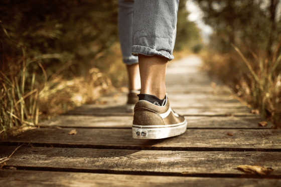 A person walking through the woods